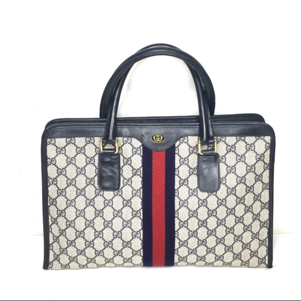 Authentic Gucci navy monogram satchel bag